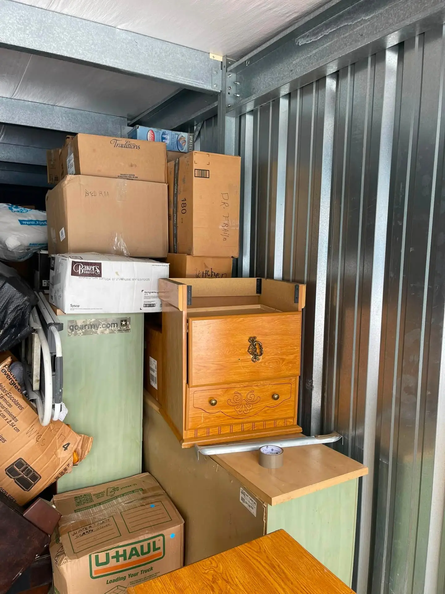 Storage unit professionally loaded with labeled boxes and furniture